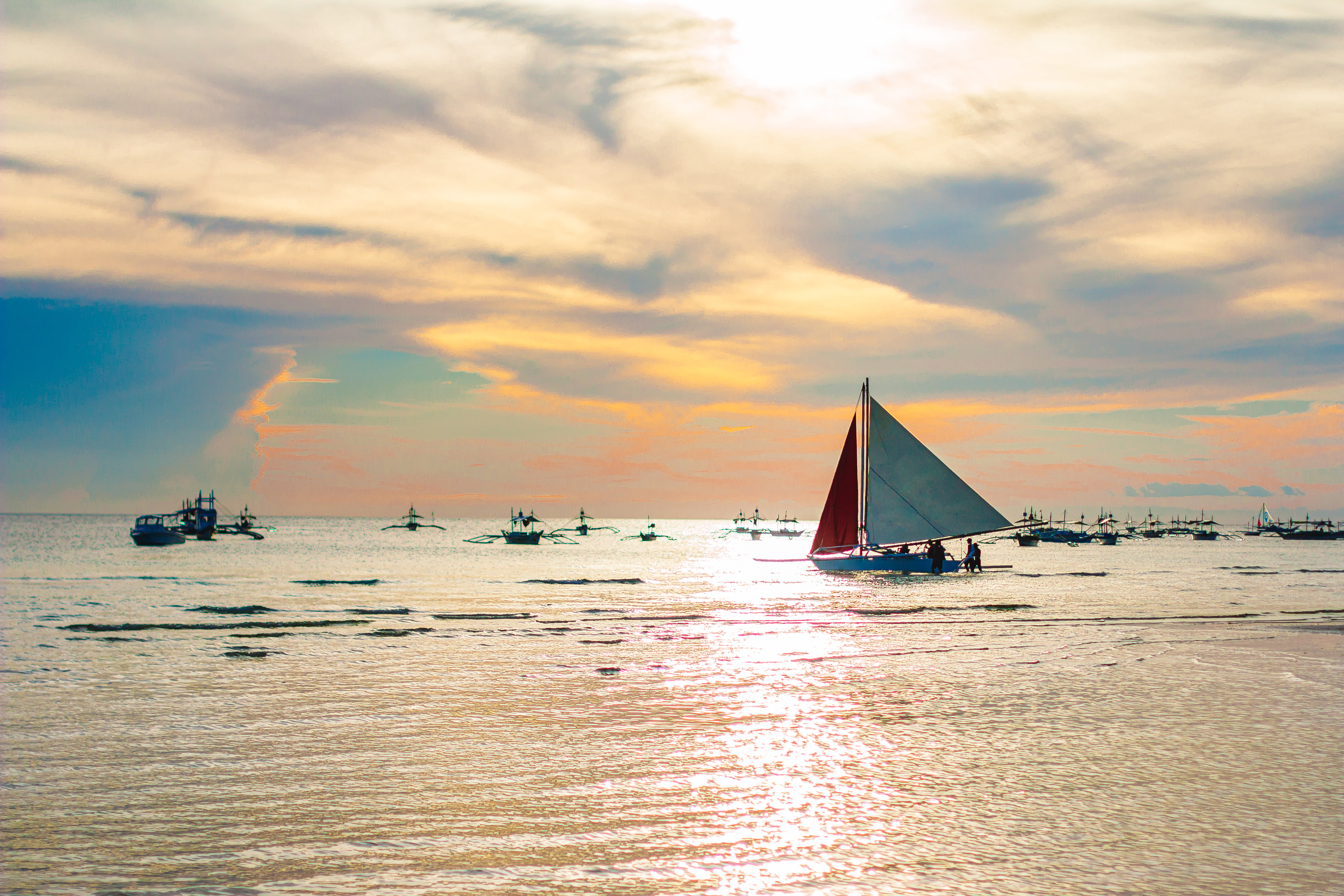 Sailing boat to the sunset in Boracay island